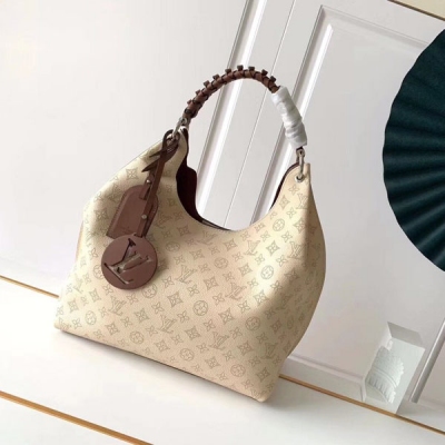 LV路易威登 SAC CARMEL 米色真皮鏤空手提包 M5...